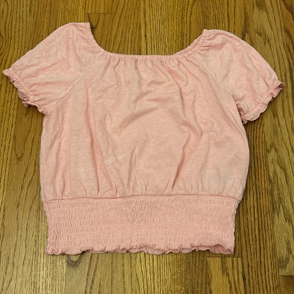 Cute ruffled pink top, never worn, tag attached